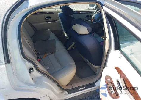 2001 Lincoln Town Car Signature из США, поврежденный, VIN 1LNHM82W91Y611232